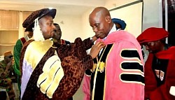 Prof. Richard Dressing A Professoral Graduating Student