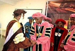 Prof. Richard Congratulating A Professoral Graduating Student